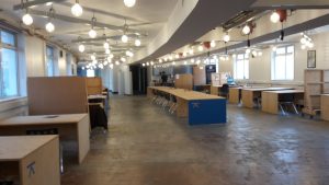 DEK growth coworking space with lots of empty desks